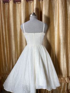 Elegant Cream Gown with Bow