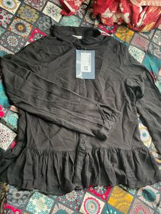 Elegant Black Peplum Top