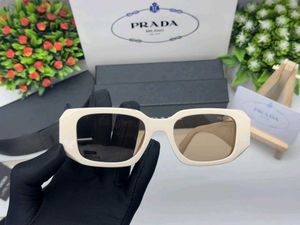 Prada Sunglasses - Chic Pink Tinted Lenses