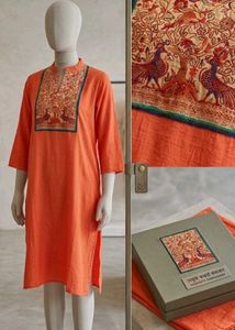 Vibrant Orange Kurta with Peacock Embroidery