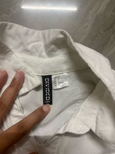 Sleeveless White Collared Shirt