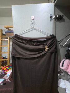 Elegant Brown Maxi Skirt with Brooch Detail
