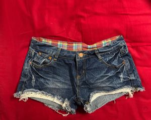 Distressed Denim Shorts with Lace Trim