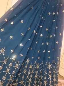 Stunning Teal lengha choli with Silver Embellishme