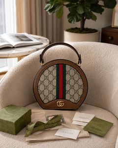 Gucci Round GG Supreme Bag