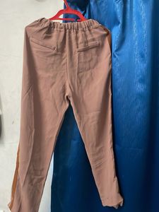 Stylish Women's Taupe Trousers with Brown Stripe