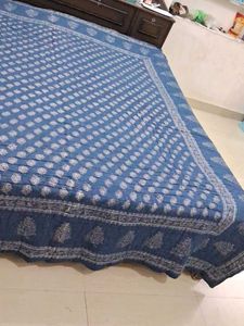 Blue Patterned Quilt Wait 1.850