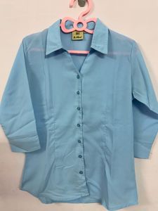 Light Blue Collared Button-Up shirt