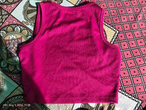 Vibrant Pink Ribbed Tank Top and white outer creat
