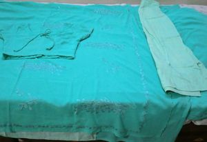 🩵Elegant Turquoise Saree with Embelli🩵shments