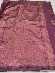 Elegant Maroon Saree with Intricate Designs