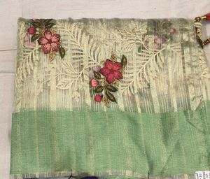 Embroidered brass saree