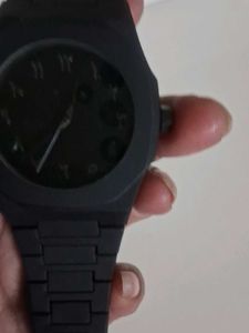 Sleek Black Watch with Unique Dial