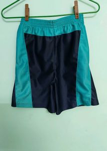 Navy blue and cyan Adidas shorts that combines spo