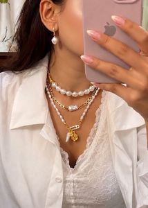 Layered Pearl & Gold Charm Necklace Set