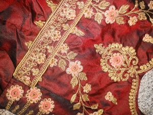 Embroidered Maroon Lehenga Choli with Pink Dupatta