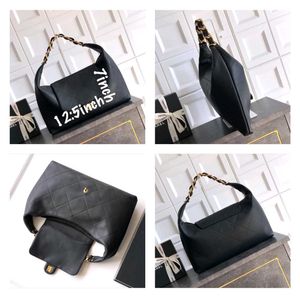 Chanel Maxi CC Hobo crafted in supple calfskin wit