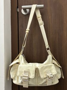 Cream/ white shoulder bag with pockets