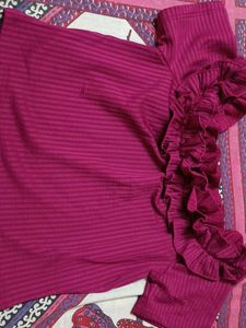 off shoulder style crop top with ruffle detail