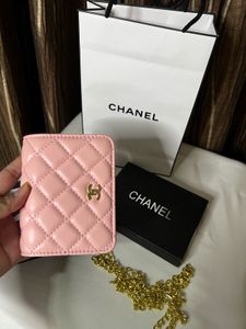 CHANEL pink Chain wallet