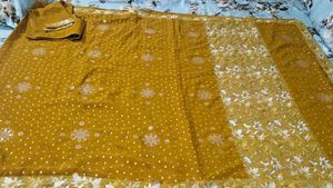 fix rate mustard totally new sari with stitch blou