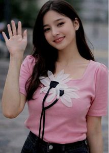 Pink Top with Floral Detail