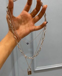 Layered Necklace with Lock &amp; Evil Eye Charm