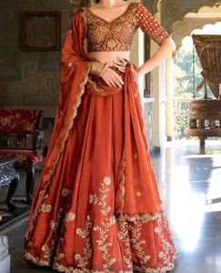 Elegant Orange Embroidered Lehenga Choli