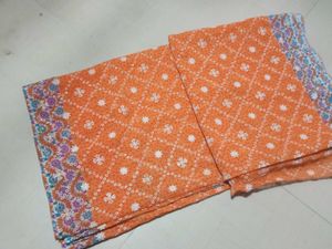 Orange Saree with White Motifs