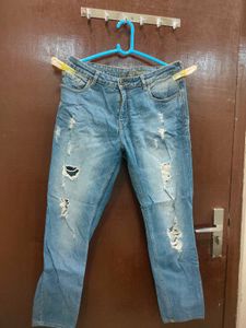 Distressed Blue Denim Jeans