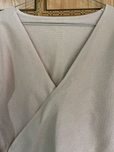 Soft Pink Ruffled Wrap Sweater