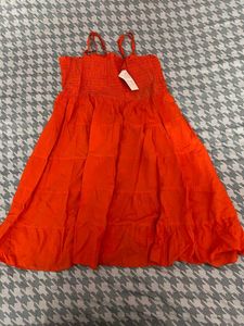 Vibrant Orange Smocked Tiered Dress