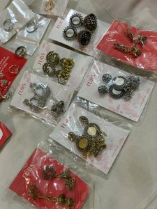 Set Of 14, 7 Rings And Earin