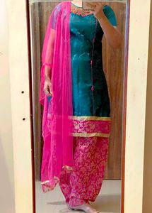 Silk Patiala Suit With Neck Embellished And Net Du