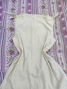Cream Sleeveless Mini Dress with pockets