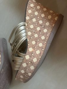 stock clearance catwalk gold wedges