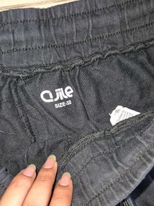 Black Cargo Pants with Slogan Print