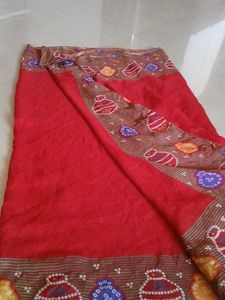 Elegant Red Saree with Unique Border Design