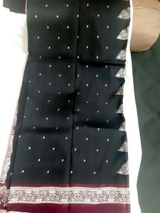 Elegant Black Saree with Intricate Borders