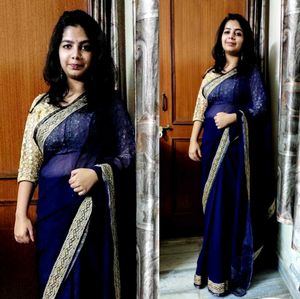 Elegant Navy Blue Saree with Gold Blouse