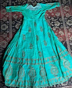 Beautiful Teal Ethnic Gown with Gold Print know an