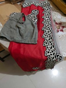 Vibrant Red Saree with Elegant Border