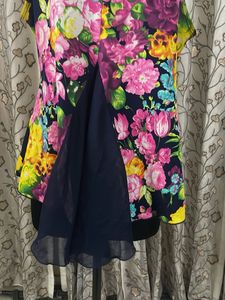 Vibrant Floral Sleeveless Peplum Top