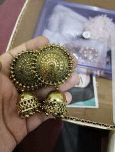 Golden colour long earings for party
