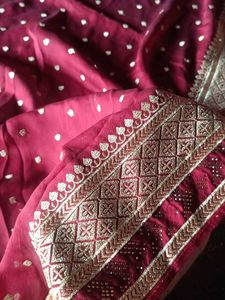 Maroon Georgette Saree with Golden Motifs