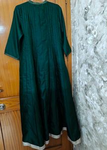 Elegant Green Gown with Embellished Border