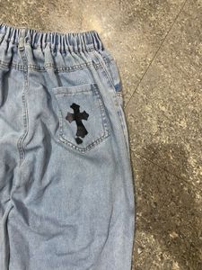 Cross Print Denim Jeans