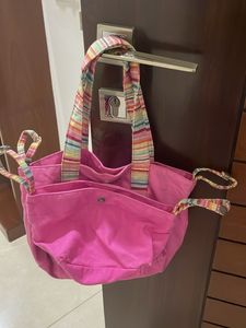 Vibrant Pink Tote Bag with Striped Handles