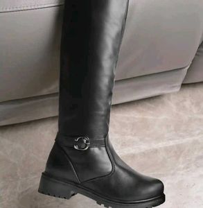 Black Knee-High Boots with Buckle Accent