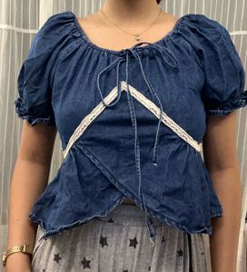 Denim Peplum Top with Lace Trim